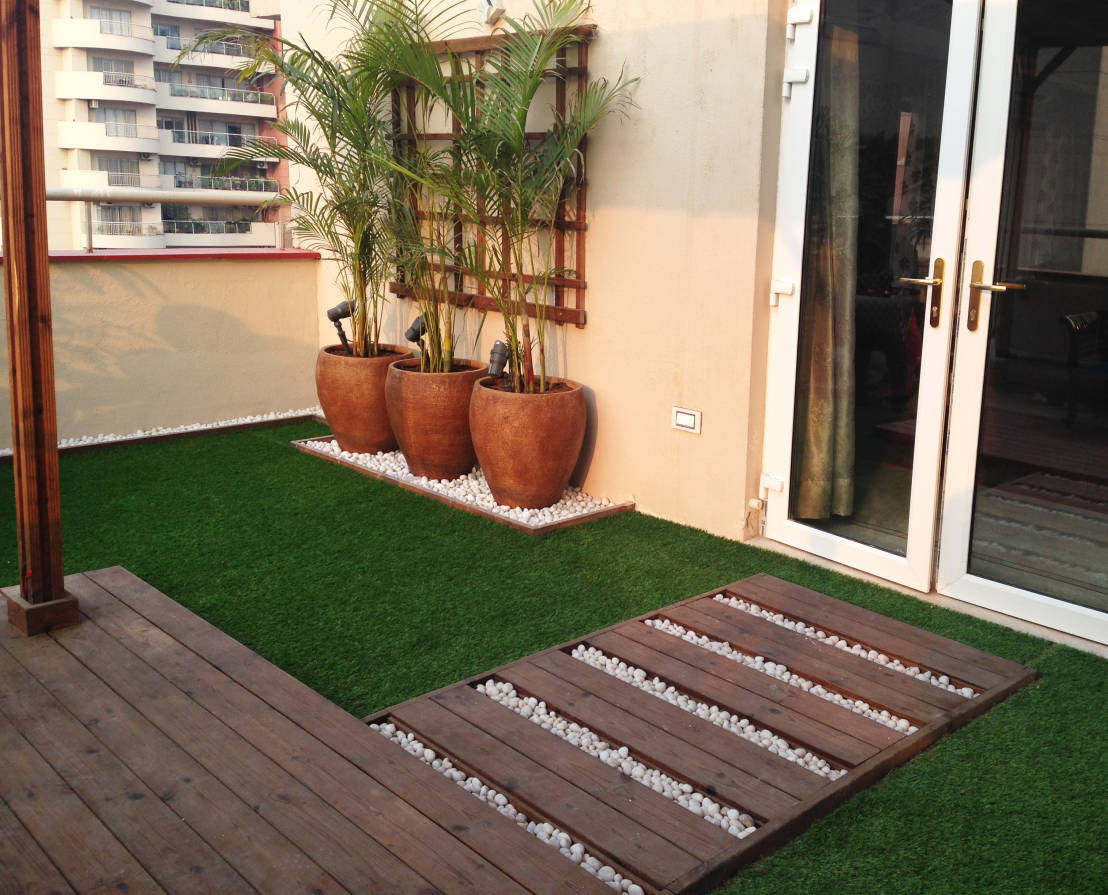 decorar con grama sintetica diseño de jardin en tu hogar